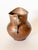 Lovely warm patina on this Antique French hammered copper pitcher. It features a rolled lip, evenly hand-hammered body,...