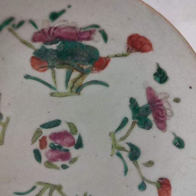 Porcelain plate with four-season floral motifs, exported during the late Qing Dynasty.