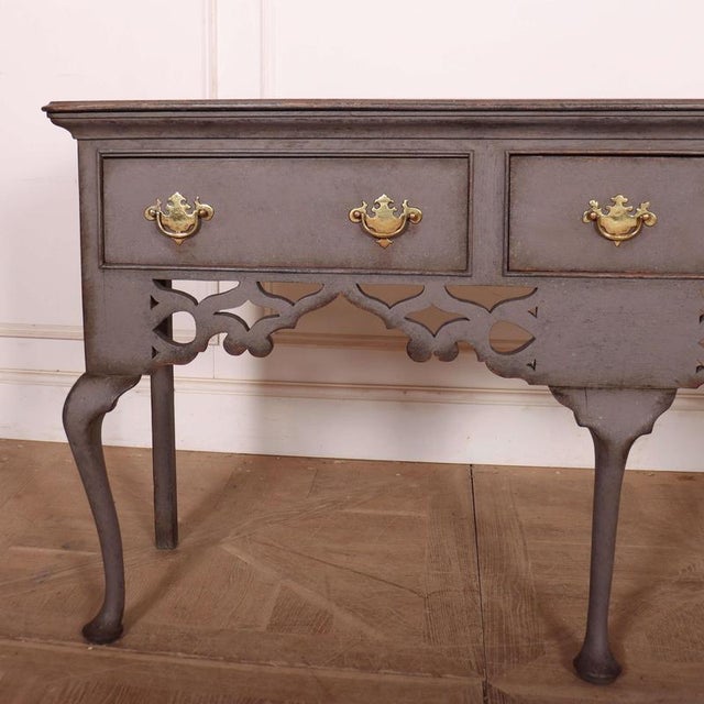 Late 18th Century painted English cabriole leg oak dresser with fretwork rail. 1790 This piece is designed in the style of...