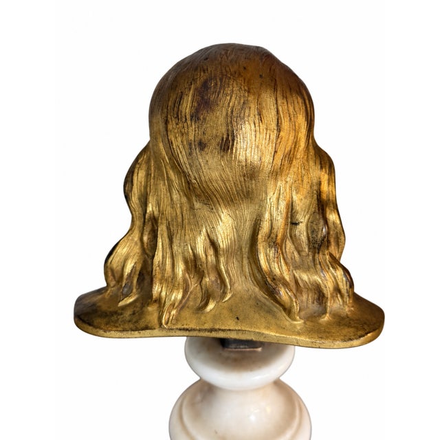 French Gilt Bronze Bust of Benjamin Franklin After Houdon on Marble Base An elegant French gilt bronze bust of Benjamin...