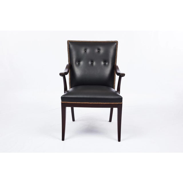 Frits Henningsen Armchair. Designed in 1949. New Black Leather Upholstery with Brass Nail Heads. Unmarked