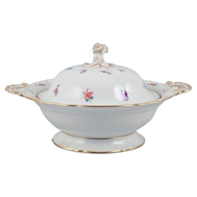 Meissen, Germany, large round lidded tureen. Hand-painted with polychrome floral motifs, gold rim. Approximately from the...