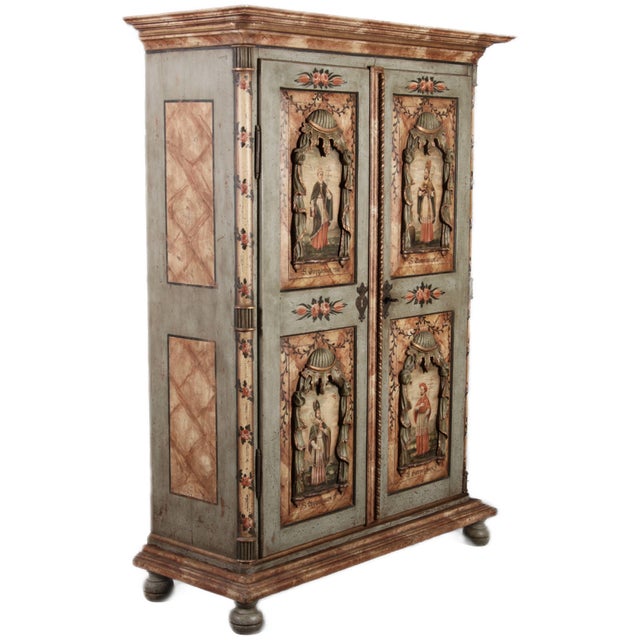 Age and Origin: The cabinet is likely from the 19th century and probably originates from Germany or Switzerland....