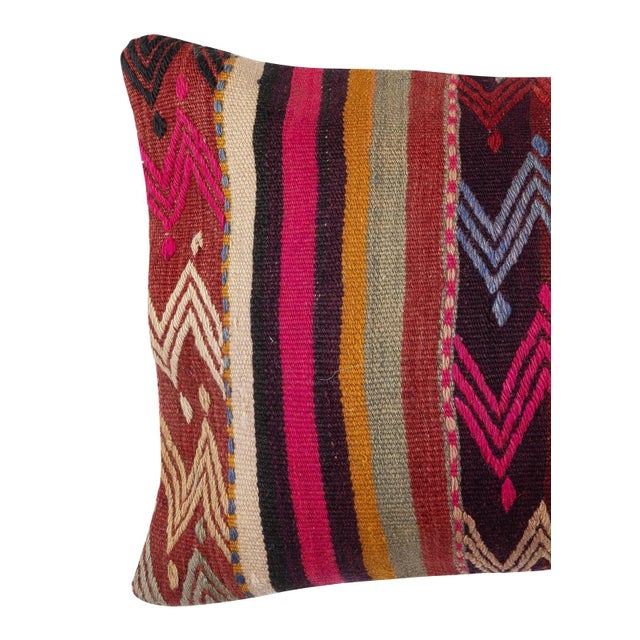 Add a touch of history and warmth to your space with this vintage handmade Turkish wool kilim cushion cover. Crafted from...
