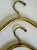 Here is a fabulous pair of vintage gold-plated clothes hangers, attributed to Lee Rowan. Beautifully made with a rich...