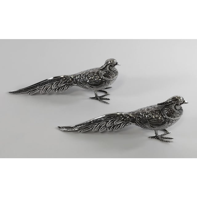 Pair of pheasants in 925 sterling silver. Made in Spain. 1970s. Measurements: 6.2 x 2.5 x 1.2 inches. Weight: 62.35 g...