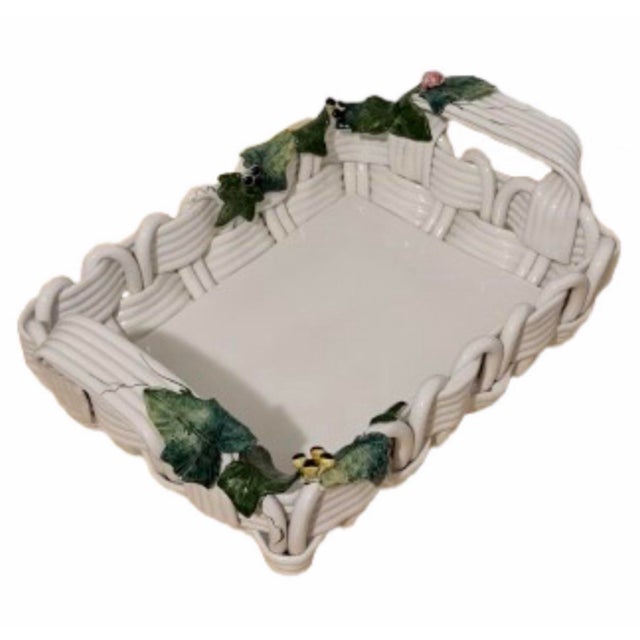 Midcentury Italian majolica basket weave style. The perfect centerpiece. White with green leaves and small fruits...