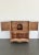 Burl Walnut Armoire with Carved Gilt Trim, Circa 1900s This stately French Rococo Revival tallboy chest combines practical...