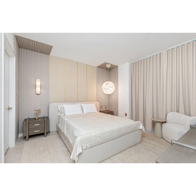 Limited edition silver pendant. 36" in Diameter by Louis Poulsen. The light source is dedicated LED. Driver is in the...