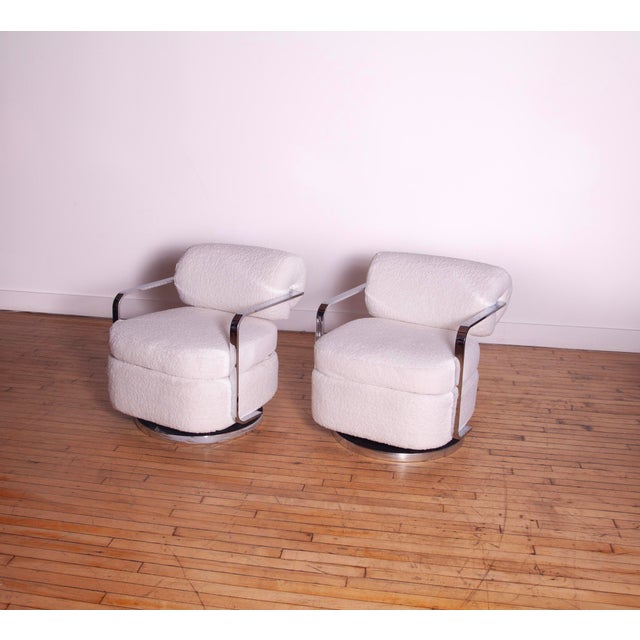 We are pleased to present a pair of 1960s Milo Baughman for Thayer Coggin swivel chairs. This specific model is quite...