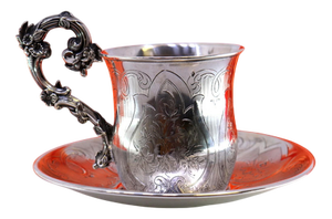 Silver Cup and Saucer with Engraved Floral Motifs