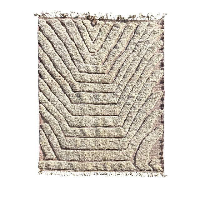 This authentic Moroccan Beni Ouarain rug is handwoven in the Middle Atlas region using traditional techniques passed down...