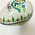 This Porcelain Box is from Portugal. It’s Egg shaped and beautifully hand-painted. The lower compartment is enhanced with...