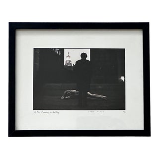 Framed Editioned Photograph A Man Dreaming in the City by Duane Michals For Sale