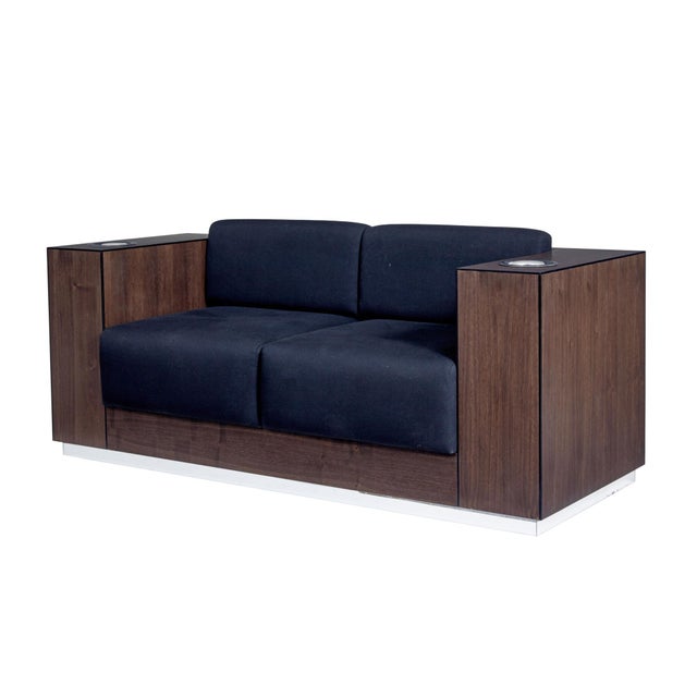 Modern walnut sofa fitted with kaelo wine coolers. We are please to offer this unique bespoke made sofa which features a...