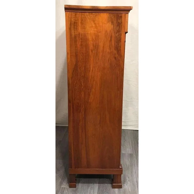 Biedermeier secretary desk, South west German, 1820. This beautiful drop front desk has three drawers in the lower part,...