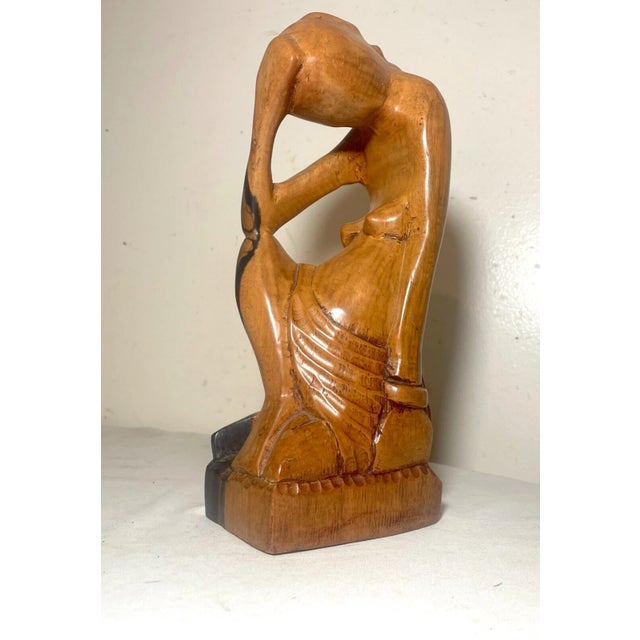 Up for sale is a wonderful antique hand carved wood abstract figural sculpture statue. This gorgeous figure is carved...