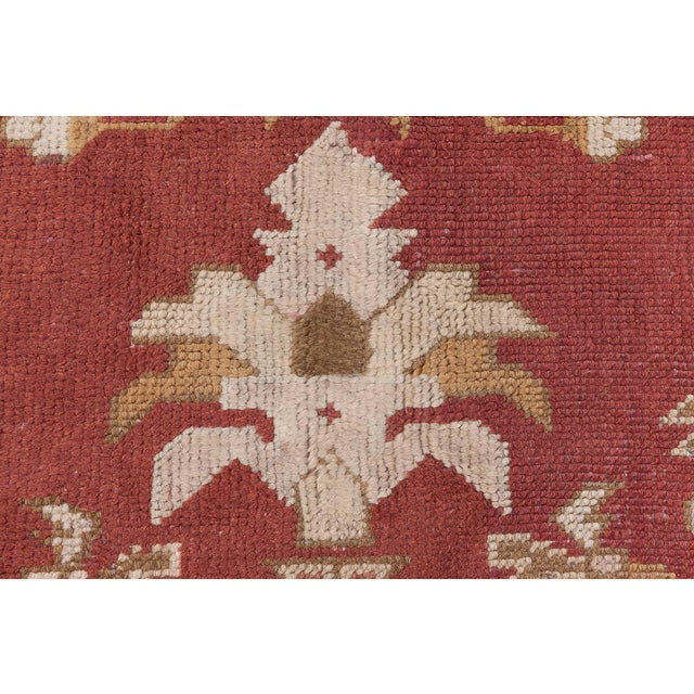 A striking example of late 19th to early 20th-century English rug craftsmanship, this antique Axminster wool rug radiates...