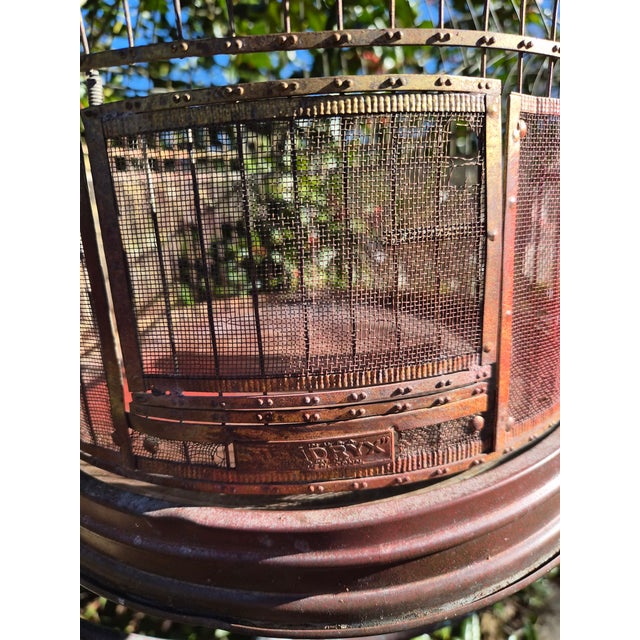 Very nice leon NY bird cage stand and Hendryx cage with just the right amount of aged patina. From the early 20th century...