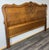 This Vintage French Louis headboard displays elegant, flowing lines and refined carved detailing, crafted in oak with a...