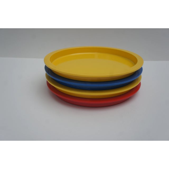 Fun set of 4 Dansk stacking plates in primary colors - red, yellow and blue. Designed by Gunnar Cyrén for Dansk in 1973....