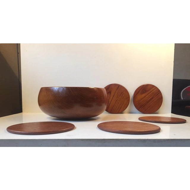 - A large organically-shaped salad bowl & 5 sushi plates - Made from solid teak - Manufactured in Denmark during the 1960s...