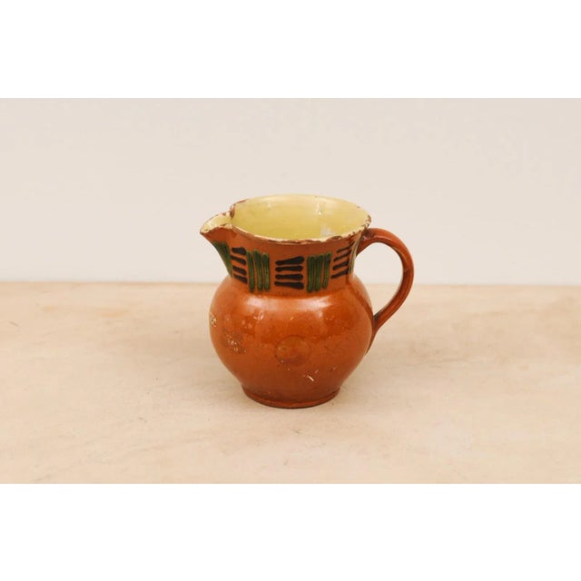 Terra Cotta French 19th Century Terracotta Pitcher from Génolhac with Russet Colored Glaze For Sale - Image 8 of 12