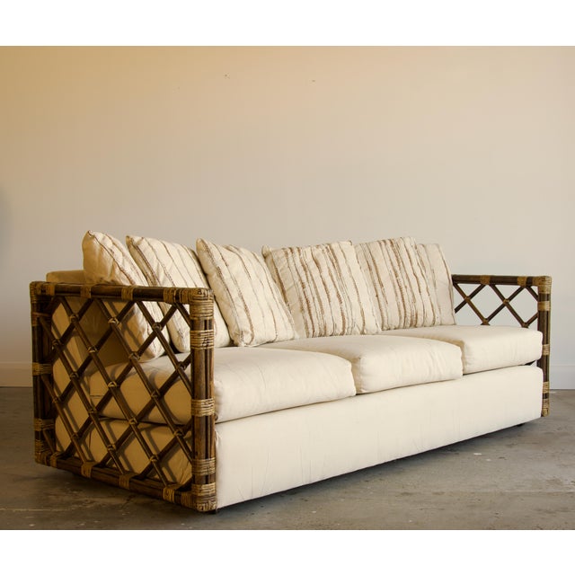 McGuire Vintage Rattan Trellis Lattice Sofa in the Style of McGuire With Casters, Wrapped Joints, and Ivory Upholstery, 1970s For Sale - Image 4 of 9