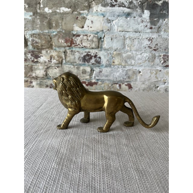 Roar-worthy charm for your shelf, desk, or curated vignette. This solid brass lion figurine exudes vintage strength and...
