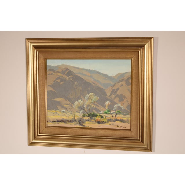 Colorful Impressionist desert landscape painting by noted California artist Sam Hyde Harris (1889-1977). Oil on board....