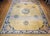 This exquisite oversized Chinese Peking rug from the late 19th century is a rare treasure of timeless elegance and...