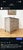 A shapely French chest of drawers, in gorgeous chippy grey paint. with elegantly carved apron and legs, brass fixtures and...