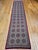 "This vintage Persian Qum runner is a rare allover design. Handwoven in the renowned weaving center of Qum, this runner...
