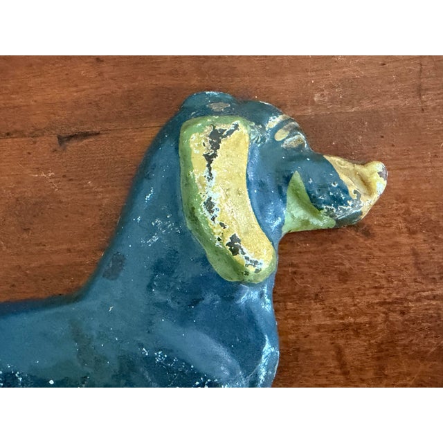 Whimsical Dachshund Doorstop made by Taylor Cook in 1930. Very little is known about Taylor Cook as a manufacturer...