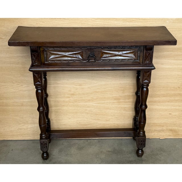 Early 20th Century Catalan Spanish Carved Walnut Console Table with one drawer and turne legs