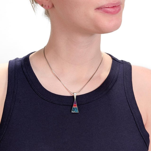 A fine Native American silver & gemstone pendant. In sterling silver. By Ray Tracey Knifewing - a collaboration between...