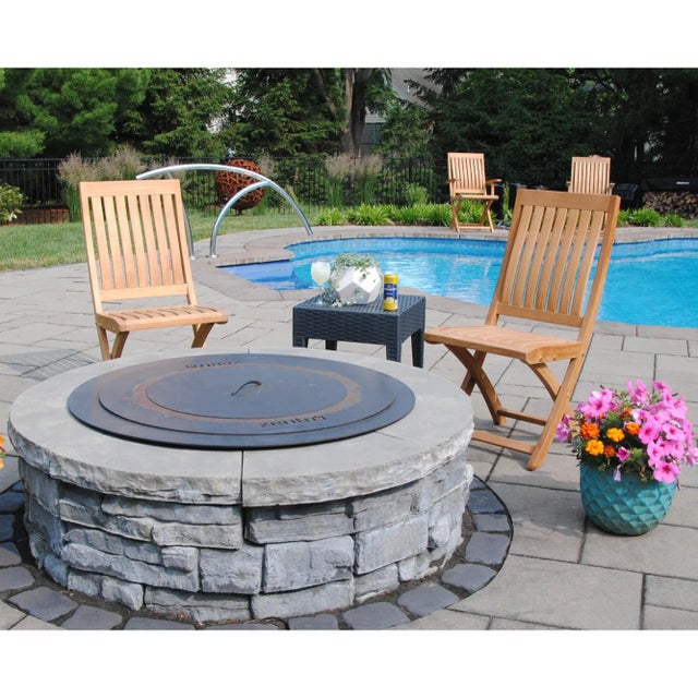 A solid teak folding chair the Niagara Teak Folding Side Chair is suitable for use either indoors or outdoors. Beautifully...