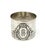 Decorative napkin ring in relief, crafted from 800 silver. The classic ornamental border and the centrally set monogram...