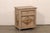 A Spanish small-scale painted wood cabinet from the mid 20th century. This mid-century side chest from Spain, crafted from...