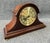 This vintage Sligh solid mahogany mantel clock features a warm mahogany case with a gracefully arched top and a detailed...