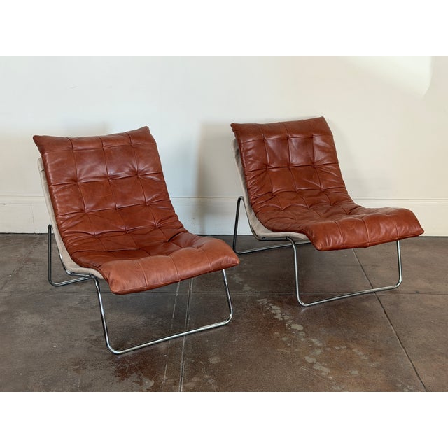 1970s chrome and cognac leather swedish lounge chairs in good vintage condition. Some minor scratches on the leather, rust...