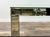 Sophisticated West Elm mirrored console table featuring a sleek rectangular silhouette, beveled mirrored panels, and a...