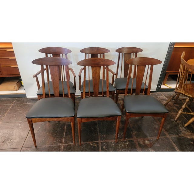 A very nice 1960s set of Bonnie Garrison Cat Eye Persimon Chairs. Set of six four regular two arm chairs. Walnut and Teak...