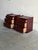 Beautiful pair of vintage Danish Modern nightstands crafted in richly toned wood with striking grain throughout. The...