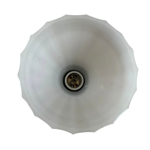 This is a great antique flush mount ceiling light featuring a fluted clam broth colored glass shade and an aged brass...