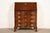 An outstanding Chippendale or Georgian style serpentine front bureau with drop front secretary desk In the manner of Baker...