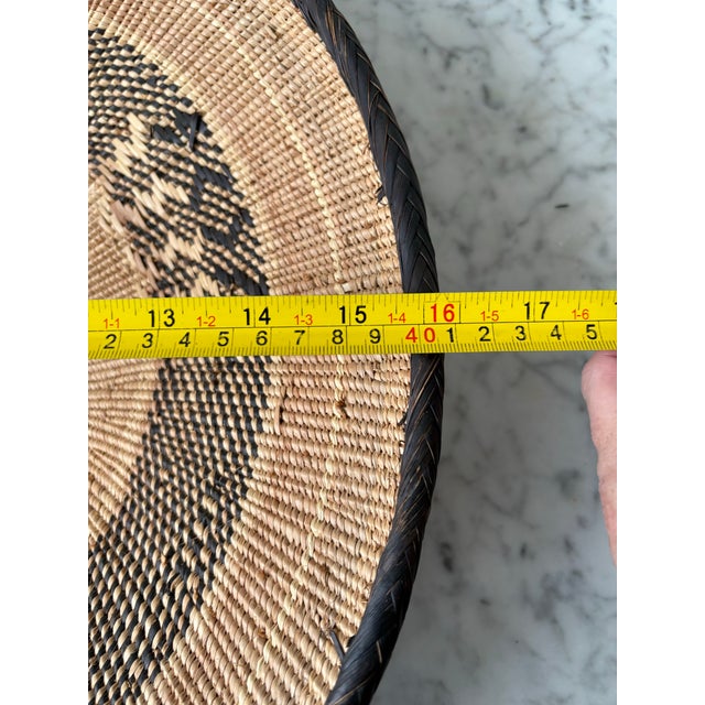 Wood Hand Woven Round Black and Tan Grass and Leather Tonga Basket For Sale - Image 7 of 7