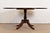 An exceptional Georgian or Regency style pedestal dining table, center table, or breakfast table By Baker Furniture USA,...