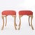 A pair of traditional William Switzer benches or stools with stylised hoof feet.
