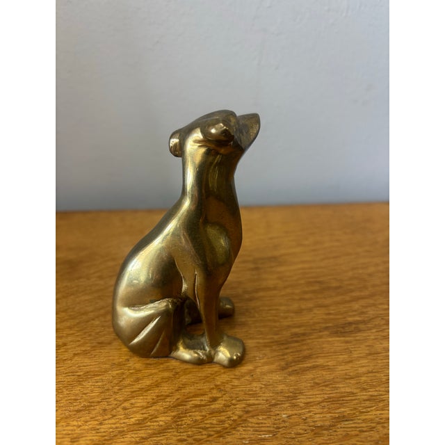 This charming vintage English brass dog may not be finely detailed, but it is all the lovelier for it. Clean in line and...